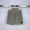 Pantalones cortos de diseñador para hombre Bordado Moda Verano Hombres Pantalones de chándal de piedra Mujeres famosas 12