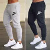 Nya joggingbyxor Herr Märke LOGO Sport Träningsbyxor Löparbyxor Byxor Herr Joggingbyxor Bomulls Trackbyxor Slim Fit Byxor Bodybuilding Byxa