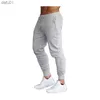 Joggers hommes pantalon pantalon de survêtement solide gris mince pantalon skinny ropa hombre survêtement pantalon décontracté gym spodnie dresowe fitness L230520