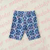 Män simmar stammar blomma tryck dragkammare strand shorts modedesigner mens badkläder