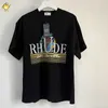 Skjortor 23SS Spring Black T Shirt Men Woman Rhude Top Tee Sea Sail Sunset Print 1 Högkvalitativ mode Lös bomull Kort ärm