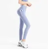 Leggings da donna Pantaloni da yoga Fitness Sport Corsa Sanded Nude Pantaloni Tasche laterali Pesca Fianchi Pantaloni corti stretti Tuta Gilrs Joggers