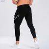 Gym noir pantalons de survêtement Joggers pantalons maigres hommes pantalons décontractés mâle Fitness entraînement coton survêtement automne vêtements de sport bas L230520