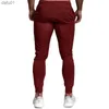 Sik Silk Męskie spodnie fitness chude spodnie wiosenne sprężyste kulturystyki trening spodni toru dolne spodnie men joggers brespants l230520