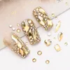 Tırnak Sanat Dekorasyonları 920pcs Tırnaklar için Şampanya Rhinestones Altın Bling Takı Düz ​​Arka Karışık Boyutlar Golddiamond Gem Taşı 230606