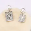 Chapado en plata 925 Marca de lujo Diseñadores Letras Stud Geométrico Mujeres famosas Cristal redondo Rhinestone Perla Pendiente Boda Blanco Colgante Pendiente Diamante p rdre