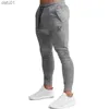 Sik Silk Męskie spodnie fitness chude spodnie wiosenne sprężyste kulturystyki trening spodni toru dolne spodnie men joggers brespants l230520