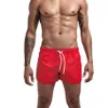 Calções de banho de verão calções de banho masculinos casa resorts surf moda praia shorts de praia masculinos roupas de banho sólidas calças masculinas