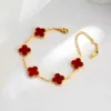 Braccialetti con ciondoli Collane Oro 18 carati alla moda Cinque fiori Quattro foglie Manipolo per bracciale Fritillaria bifacciale da donna Lucky Grass