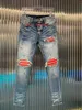 Jeans masculinos de grife com buracos rasgados, jeans divididos para bicicletas, jeans justos para motocicletas, calças masculinas da moda, hip-hop