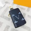 Designer Fashion PU Nyckelringar Key Ring Män Kvinnor Väskor Hängande Buckle Keychain Car Handgjorda läderhänge Key Chain Plånbokspåsar Pendant Mynt Tillbehör