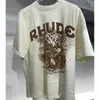 23ss Rhude Summer Cotton Flower Slogan Print Couple 1 T-shirt de manga curta branca S-xl Rpp5