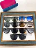 Womens Zonnebril Voor Vrouwen Mannen Zonnebril Heren Mode Stijl Beschermt Ogen UV400 Lens Met Willekeurige Doos En Case 0010S 11