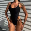 Kvinnors badkläder One Piece Baddräkter Kvinnor Lace Up Backless Thong SwimeWear 2023 Sexig Solid Black Criss Cross Bathing Suage Slimming Bodysuits T230606