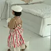 Девушка платья 2023 Весенняя корейская детская детская юбка для девочек милый мультипликационная платья для мультипликации подвеска бутик