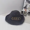 Designer Grass Braid Beach Hat Womens Straw Hats Fashion Letters Summer Bucket Hat Foldbar God kvalitet Fashion Cap Men