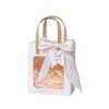 Emballage cadeau 10 pièces/lot sac haut de gamme fenêtre transparente conception tenu dans la main exquis mariage anniversaire petit emballage Carton vide