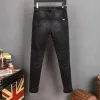 Novos jeans e calças masculinos de grife pretos justos adesivos com furo para lavagem de motocicletas jeans Joker Rock Revival