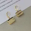 Nouveau sac à main pandent boucles d'oreilles Style féminin lisse en laiton plaqué or perle boucles d'oreilles bijoux de luxe E3020