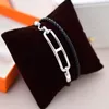 Classic European and American Designer Bracelet Fashion Pig Nose Woven Leather Rope Two Loop Bracelet Punk Double Layer Bracelet Necklace Couple Choker Short Chain