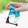 Novel Games Alloy Finger Scooter Finger Toy Skateboards With Pants Shoes and Tools Finger Scooter Toy Mini Skateboard Finger Toy for Gift 230606