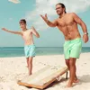 Herrbadskläder vatten färgbytande strand korta byxor sommar män vuxna barn simning stammar fast färg snabb torr surf shorts badkläder 230606