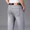 Mens Jeans märke rakt lätt bomullssträng denim affärssammantrån med hög midja tunt ljus grå 230607
