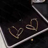 23ss pendientes de diseñador para mujer pendientes de tuerca con logo de corazón pendientes de tuerca verticales 925 pendientes de aguja de plata joyería de mujer de alta calidad a1