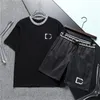 Camisas de luxo agasalho casual manga curta suor terno moda masculina 2 peça conjunto secagem rápida blusa camisa shorts304p