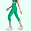 L065 Enfärgad hög midja beskurna byxor Inga T-Line Yogabyxor Slim Fit Leggings Träningsbyxor Nake Feeling Capris Dam Elastic Tight