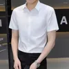 Hommes chemises décontractées hommes élastique à manches longues coréen coupe ajustée robe d'affaires pouces chemise hauts pour hommes vêtements Camisas Y Blusa