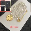 Haut de gamme 18K Plaqué Or Laiton Cuivre Coeur Pendentif Collier Femmes Designer Marque Lettre Colliers Ras Du Cou Chaîne Cristal Imitation Perle De Mariage Bijoux Cadeaux