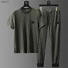 Novo terno esportivo casual de seda de gelo de verão, camiseta fina plissada + calça, conjunto de duas peças, agasalho masculino respirável de alta qualidade L230520