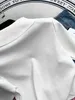 Polos Polos Designer White Polo Neck Knit T-shirt Summer Thin 2023 Nowy unikalny krótki rękaw Top 7D0L