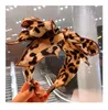 Wholesale Fashion Trend Women's Headband Leopard print hair band with multi-layer bow fairy series hair band accessories