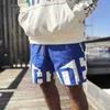 Designer Court Mode Vêtements de loisirs Shorts de plage en conserve Rhude 23fw High Street Industrie lourde Épissé Couple tissé Lâche Capris Joggers Sportswear Outdo