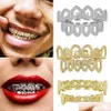 Grillz dentystyczne grille 18k złoty hip -hop fl diamond puste zęby grillz lodowane fang ortodaż czapkę zębami wampir cosplay biżuteria dhhaf dhhaf