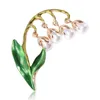 Broches printemps frais feuille verte cloche fleur d'orchidée broche pour femmes élégante plante perle bureau vêtements broche accessoires cadeaux