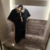 Vestido de verão para mulher lapela pescoço emenda clássico xadrez magro camisa polo respirável luxo ao ar livre casual designer roupas femininas 0912