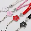 Wholesale 100pcs Creative Weaving Leather Cell Mobile Phone Strap Bracelet Lanyard New Plum Flower Weaving Short Wrist Strap Charms for Girl Women Gift 2023