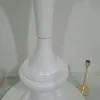 Белые вазы металлические подсвечники свеча.