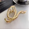 Bengelen kroonluchter elegante gouden dames geometrische metalen haar klauwen nieuwe haai clip hoofddeksels haar clip mode bad clip meisjes haaraccessoires Z0608