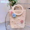 Factory wholesale ladies shoulder bags 4 colors sweet girl seaside holiday straw beach bag hand-woven mesh rose fashion handbag small fresh pearl handbags