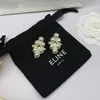 チャームデザイナーArc de Triomphe Pearl Brass Earrings 2023新しいシンプルな高度な感触女性G9yp