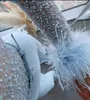 パーティードレスヴァーンゴモダンライトブルースパンコールジャンプスーツの女性キラキラ羽毛宝石首の長袖レディカスタムメイド