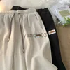 Herr shorts casual shorts män sommar tunn snabb torr joggar knälängd trendig lösa all-match stiliga lappar harjauku daglig stilfull man j230608