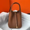 2023 Ny vegetabilisk korg One-Shulder Kvinnor Bagwomens lyxiga handväska storkapacitet Lychee Grain Leather Bucket Bag