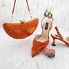 Sandalen QSGFC Nigeria Populaire Afrikaanse Dames Schoenen En Tas Oranje Kruis Diamant Riem Decoratie Prachtige Banket Dames Schoenen En Tas J230608