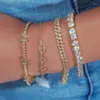 Braccialetti di collegamento Catena cubana di cristallo ghiacciato di lusso per le donne Regalo di gioielli con bracciale tennis con strass a farfalla dorata multistrato