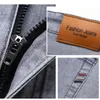 Mens Jeans Brand Fit rak lättvatt bomullsträcka denim Business Casual Hög midja Tunna ljusgrå 230607